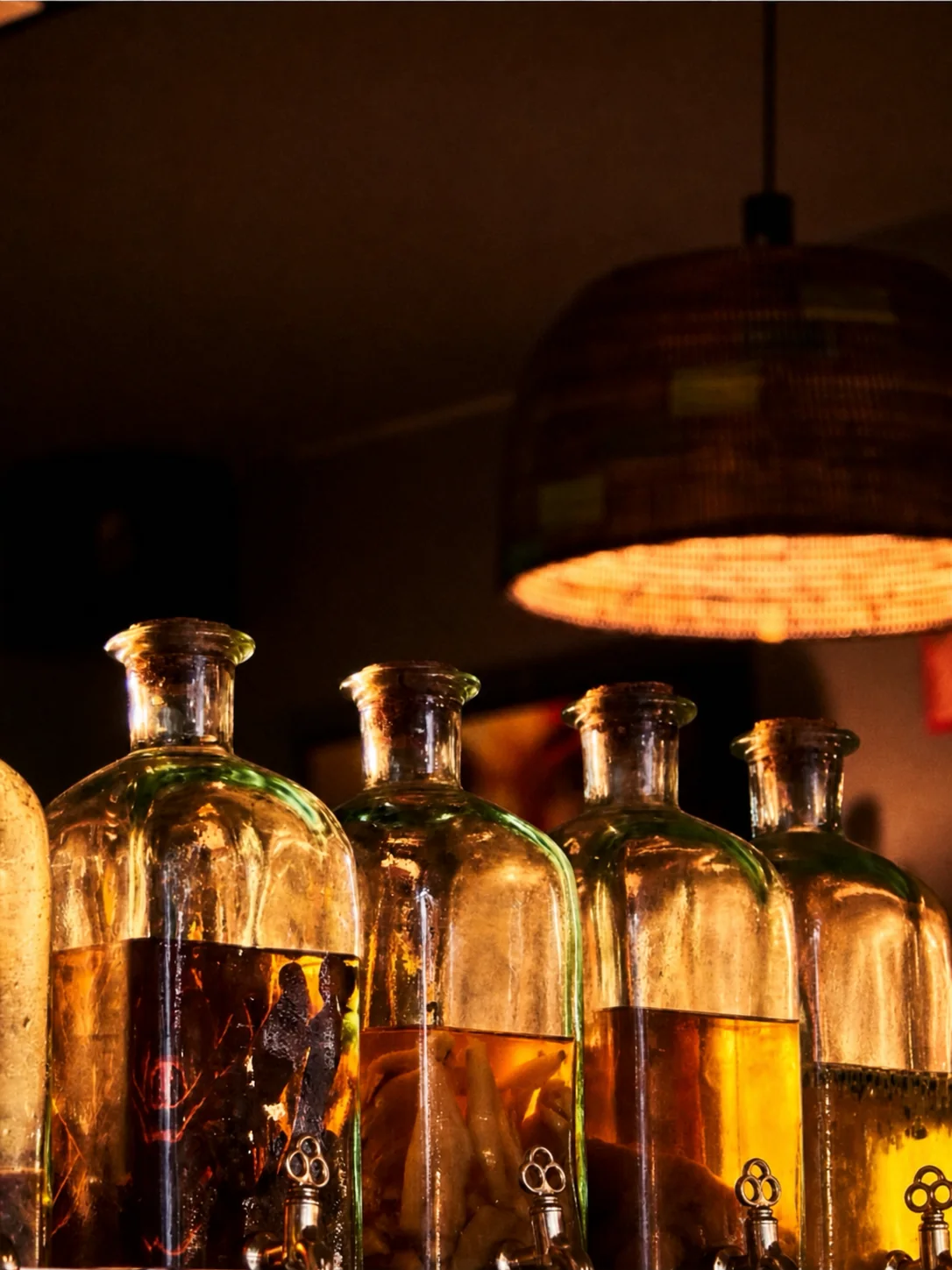 Bouteilles de rhums arrangés de la maison